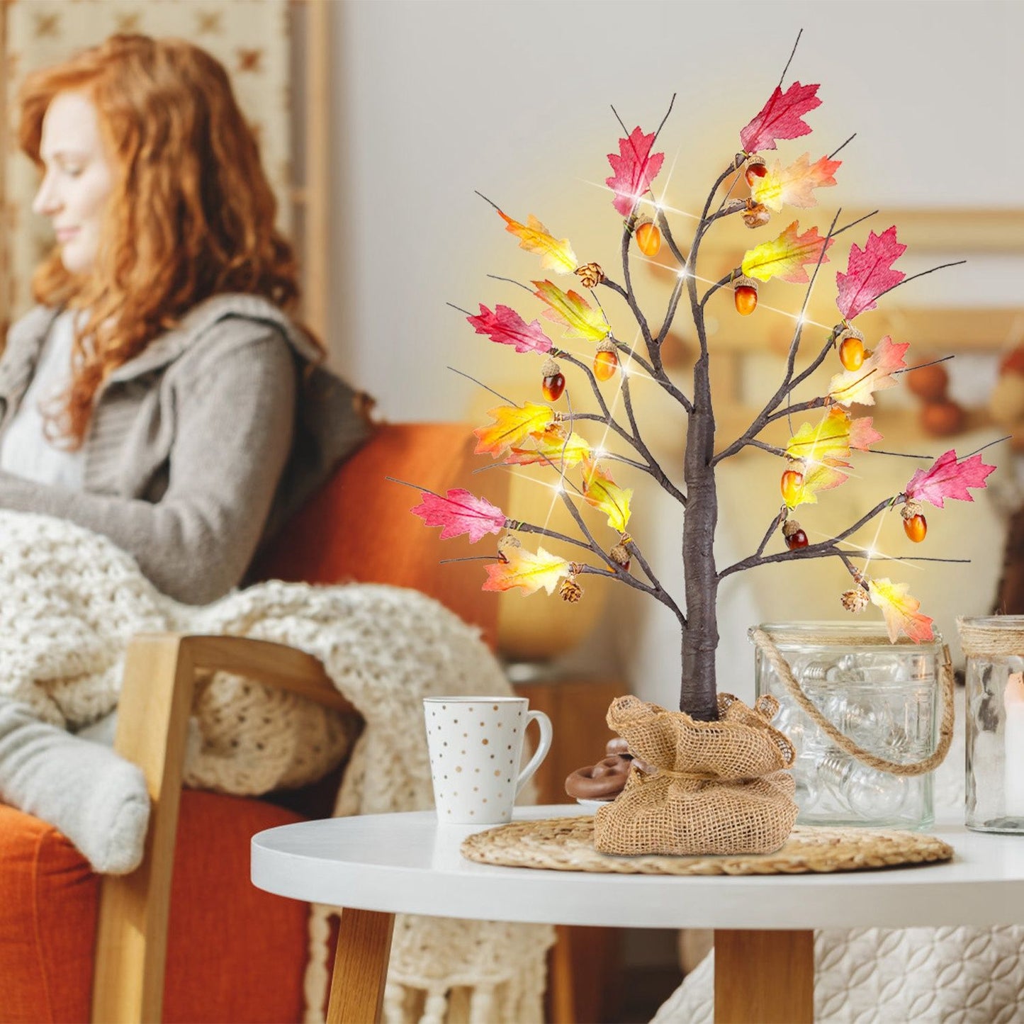 FauxMart.com autumn LED light-up decorative tree with fall leaves and acorns on white table