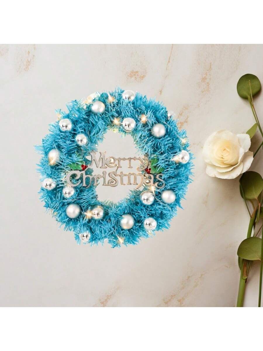 24 inch blue Christmas wreath adorned with pearls and a Merry Christmas greeting