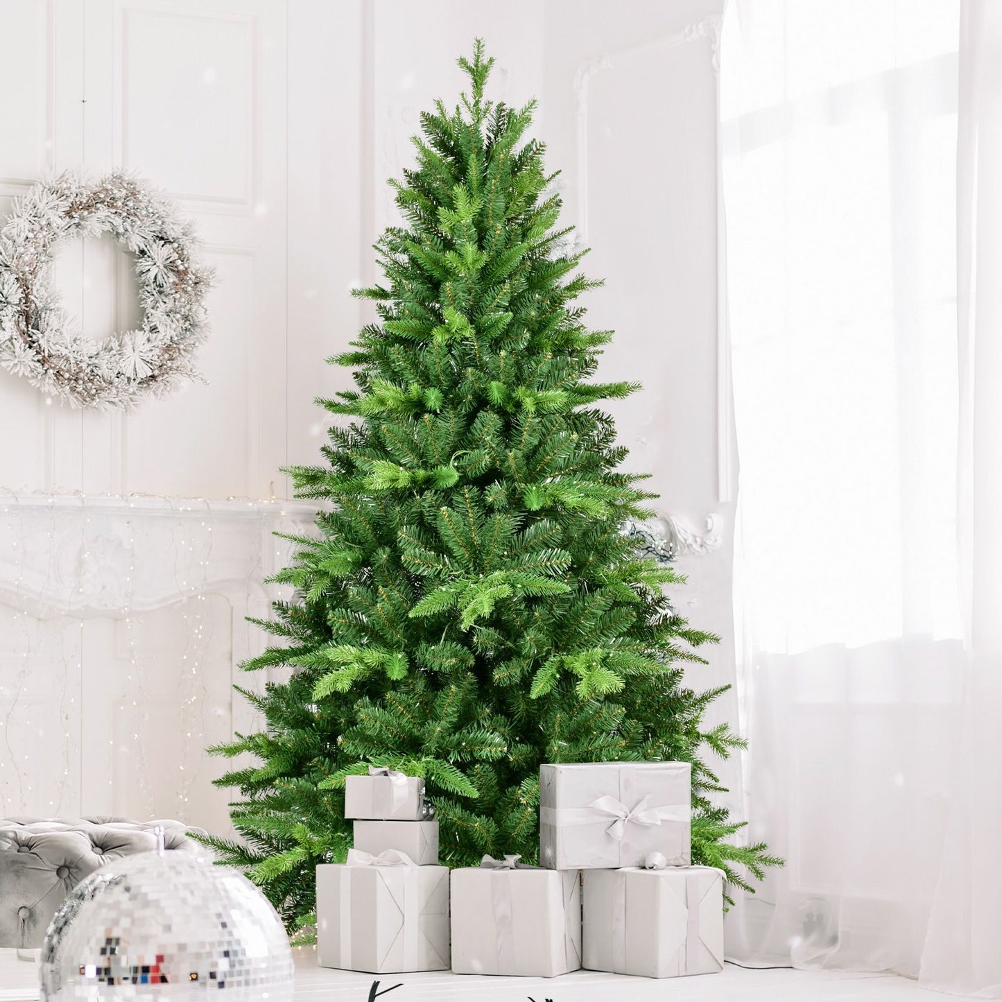 6ft pre-lit Christmas tree with lush green branches and decorative gifts underneath