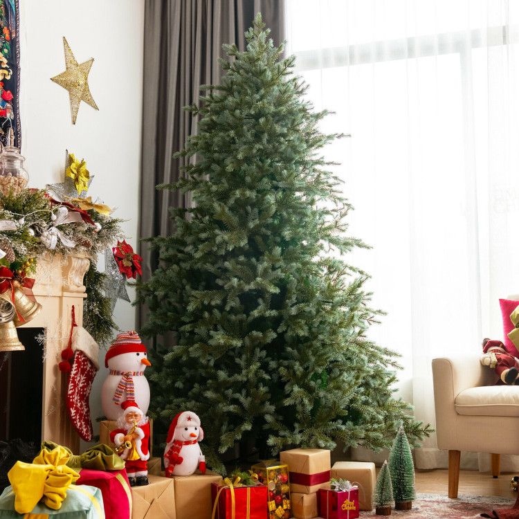 7 foot artificial Christmas tree in living room with holiday decorations and wrapped gifts