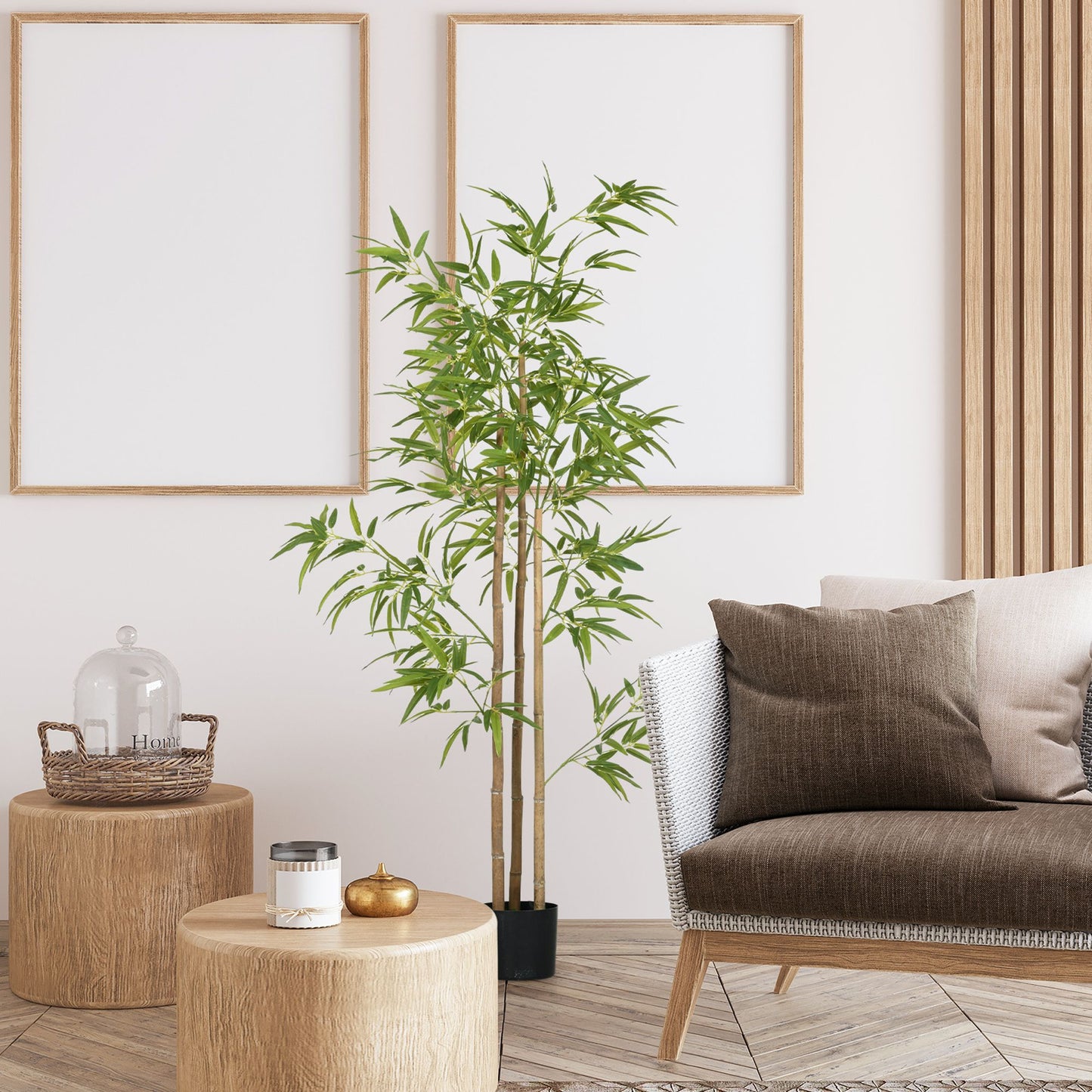 Artificial bamboo tree 6ft in black pot placed in a modern living room with wooden furniture and neutral decor