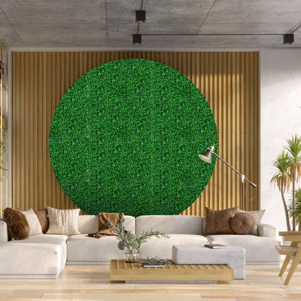 Artificial boxwood hedge panels featured in a modern living room setting with stylish decor