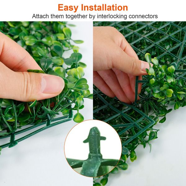 Close-up of hands installing artificial boxwood hedge panels using interlocking connectors