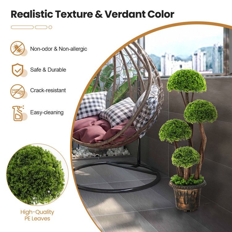 Artificial cedar topiary tree with realistic texture and vibrant green color in a decorative pot on a balcony