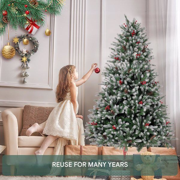 Child decorating an artificial Christmas tree 7ft with ornaments in a cozy living room setting