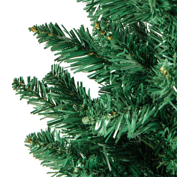 Close-up of artificial Christmas trees set showing realistic green branches for festive decorations