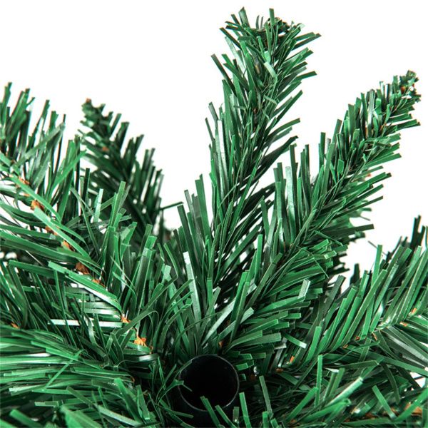 Close-up of green branches for an artificial Christmas trees set, perfect for holiday decoration