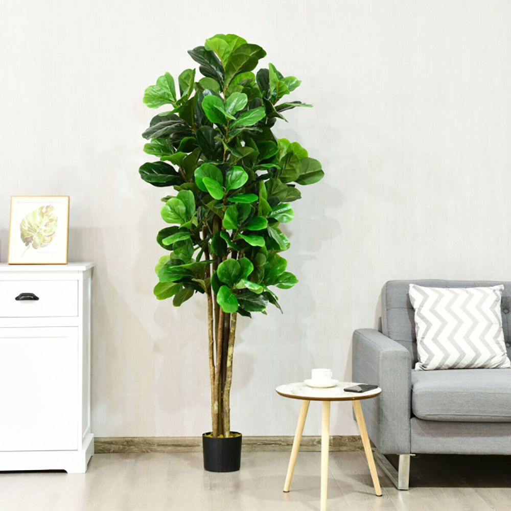 Lifelike artificial green plants indoor in a stylish living room setting with modern furniture