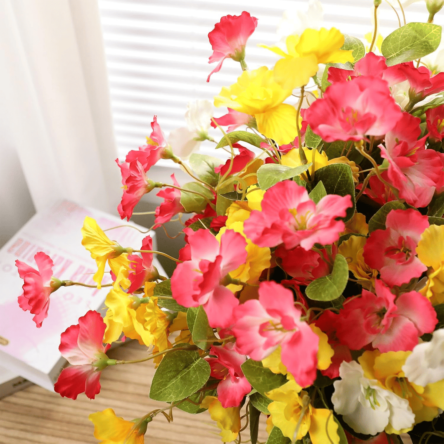 Vibrant artificial hibiscus flowers outdoor in assorted colors for brightening gardens or patios