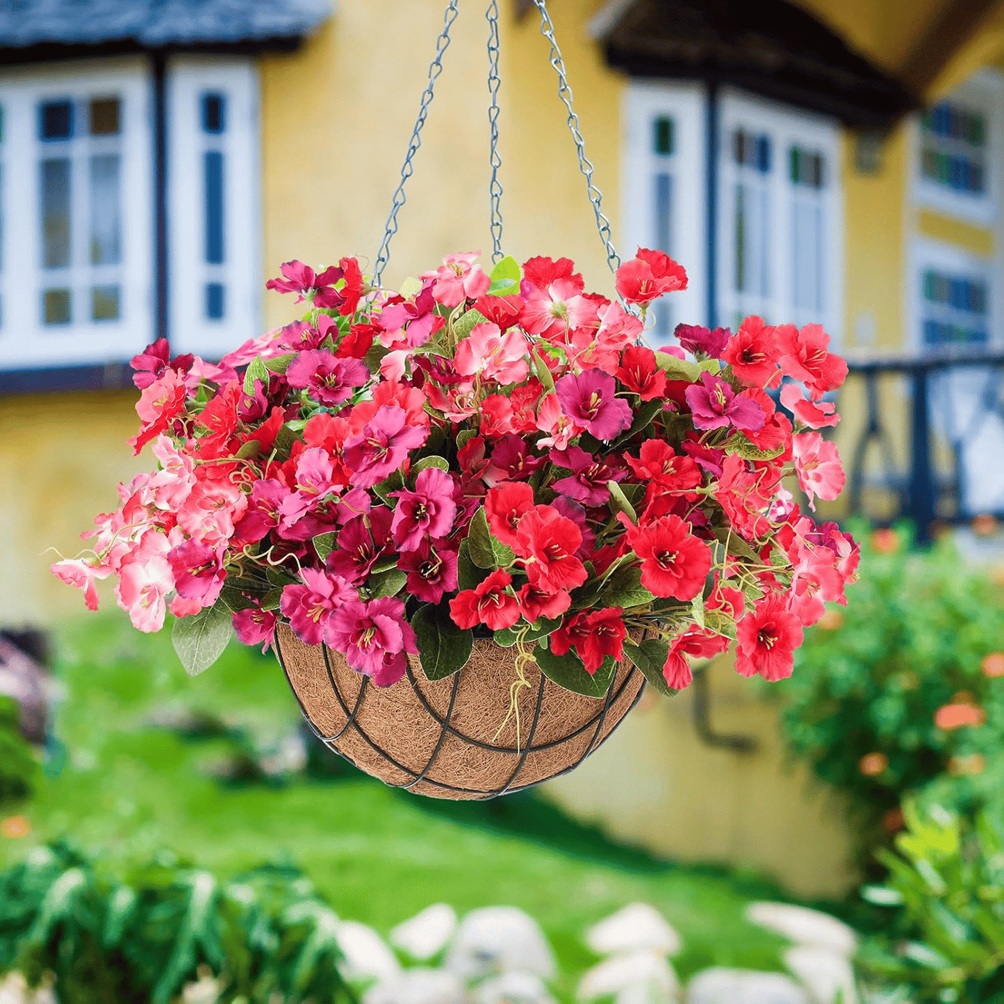 Vibrant artificial hibiscus flowers outdoor in hanging basket for garden decor