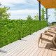 Lush artificial ivy privacy fence installed in an outdoor space for enhanced privacy and aesthetic appeal