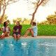 Artificial ivy privacy fence enhancing outdoor pool area with greenery for better privacy