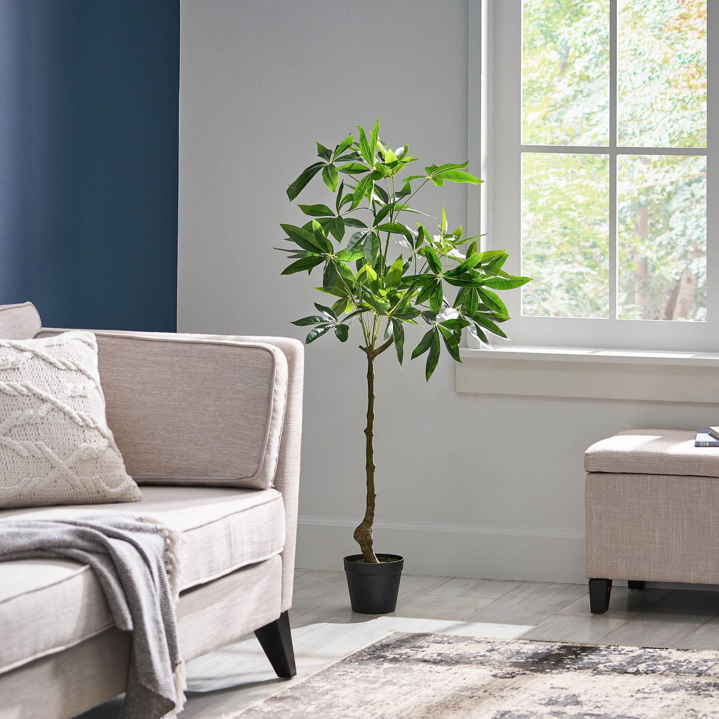 Lifelike artificial money tree plant in a black pot, perfect for home decor and adding greenery