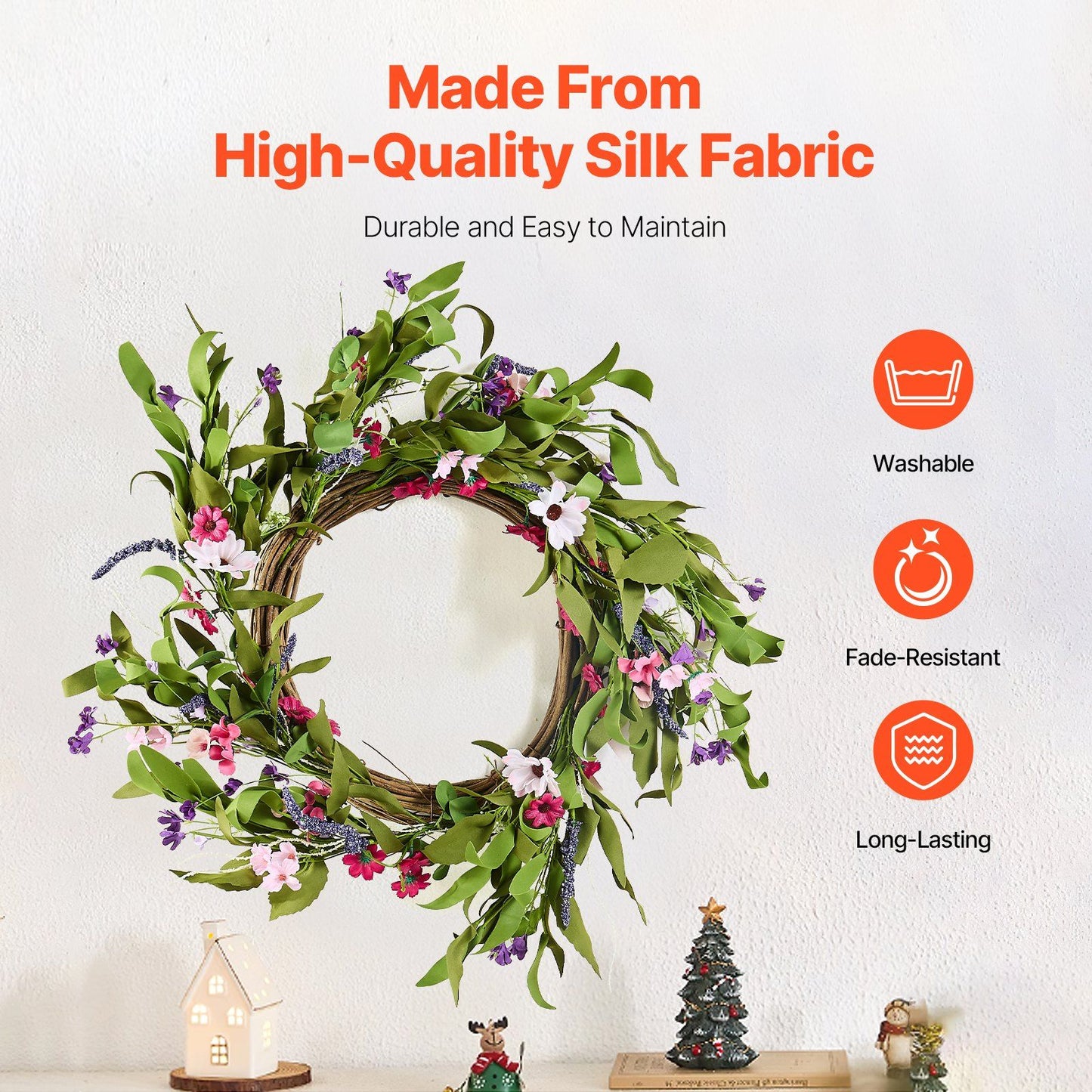Artificial pink daisy wreath made from high-quality silk fabric with green leaves and small flowers