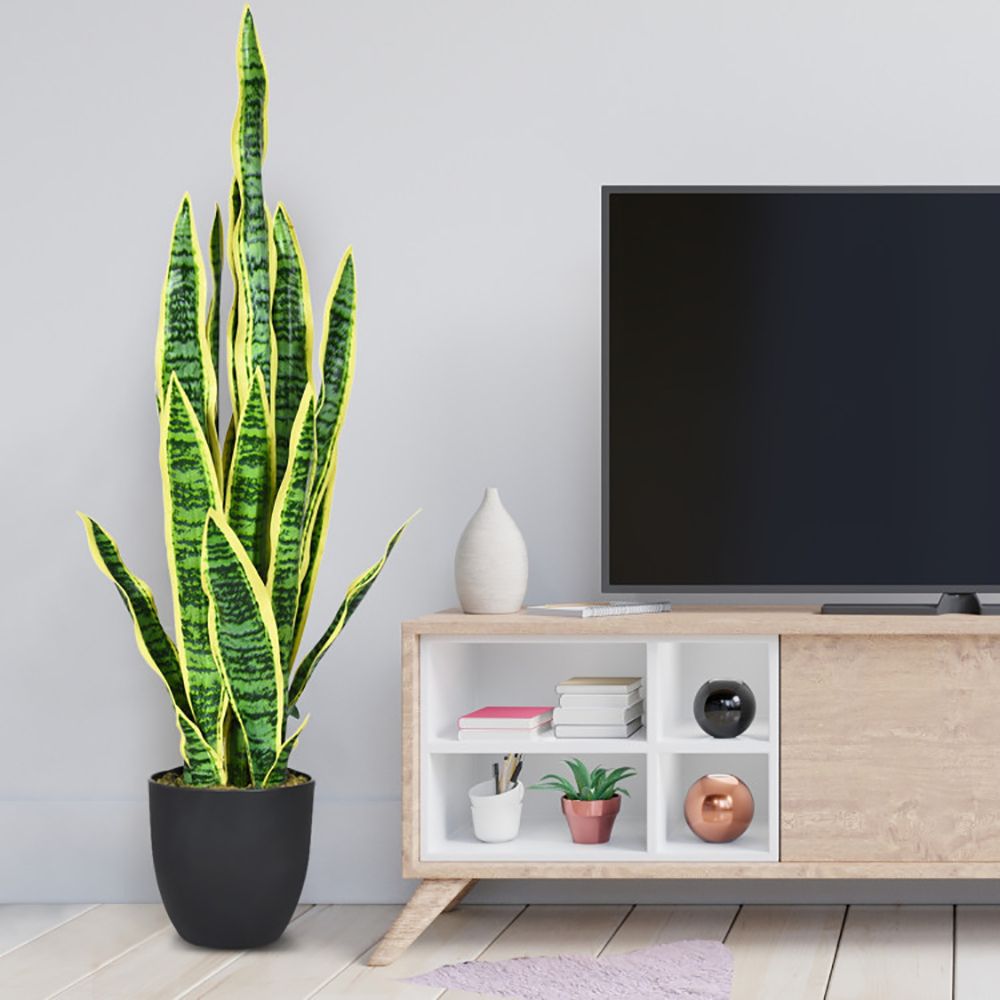 Tall artificial snake plant decor in a black pot, perfect for adding greenery to any room