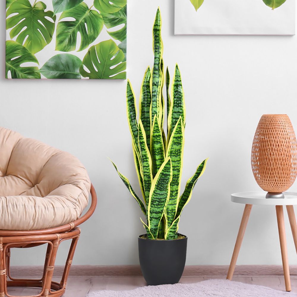 Realistic artificial snake plant decor in a black pot, perfect for home or office styling