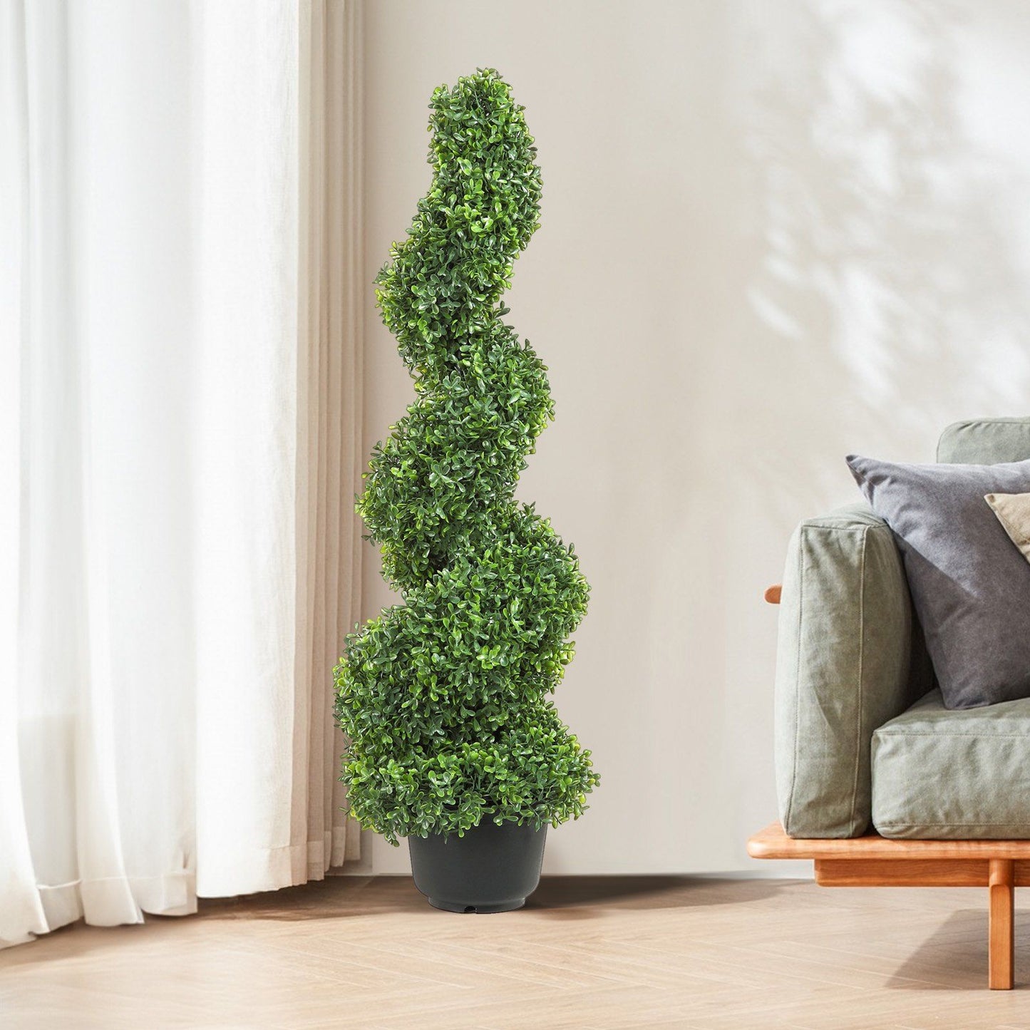 Artificial spiral topiary in a black pot, perfect for indoor and outdoor decoration