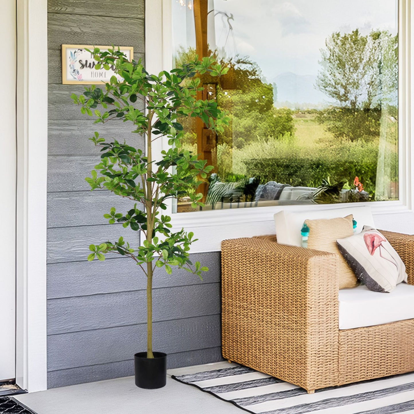 Lifelike artificial tung tree plant in a black pot, perfect for home decor and indoor spaces