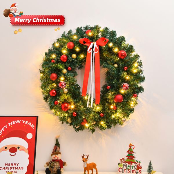 Festive battery powered Christmas wreath decorated with red ornaments and lights for holiday cheer