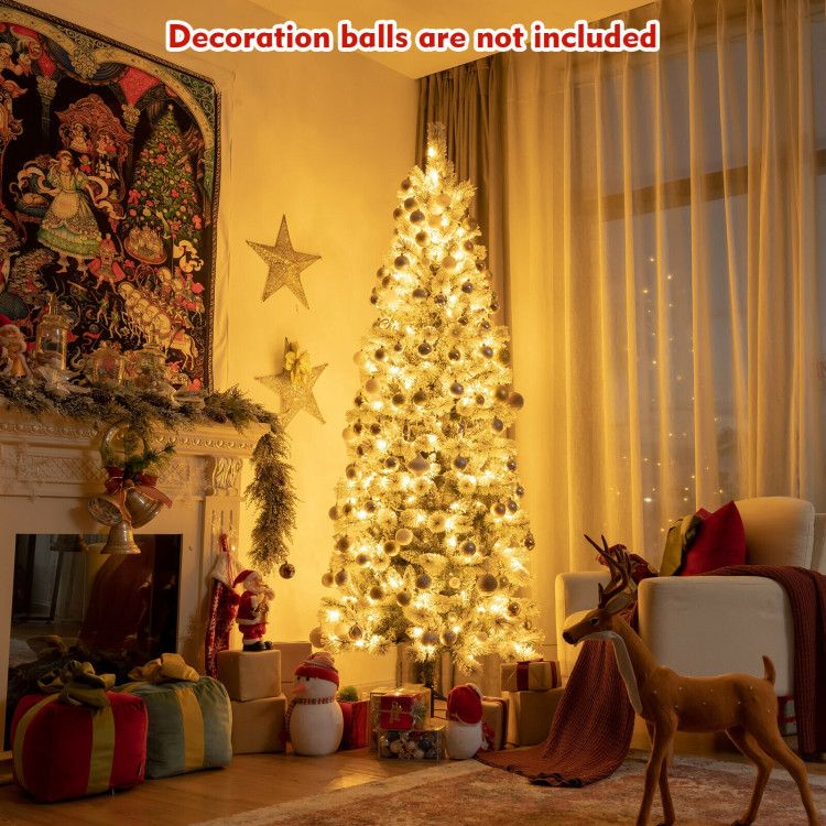 Christmas tree with 9 lighting modes glowing warmly in a cozy living room decorated for the holidays