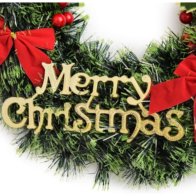 Festive Christmas wreath for front door featuring Merry Christmas sign and red bows