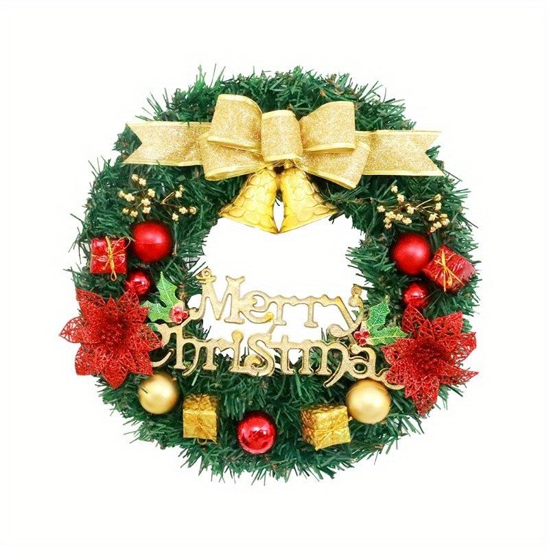 Decorative Christmas wreath for front door with gold bow and festive ornaments
