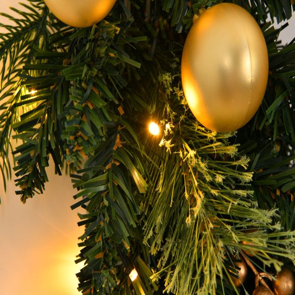 Beautiful pre-lit Christmas wreath with remote and gold ornaments for holiday decoration