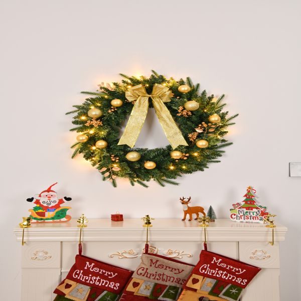 Beautiful pre-lit Christmas wreath with remote, adorned with gold ornaments and a ribbon bow