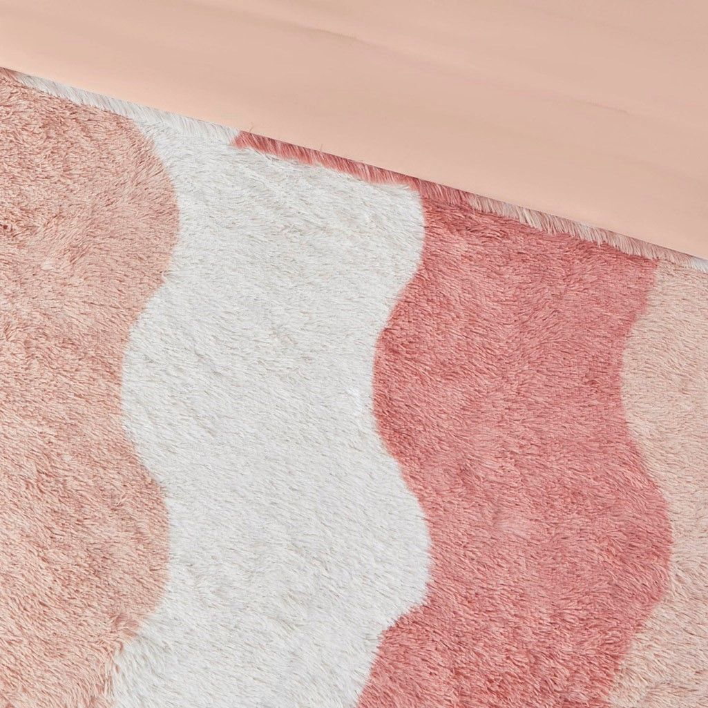 Ombre faux fur comforter set with soft textured waves in shades of pink and white