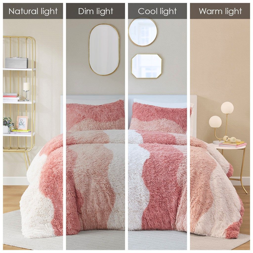 Ombre faux fur comforter set in shades of pink and cream displayed under natural, dim, cool, and warm lighting