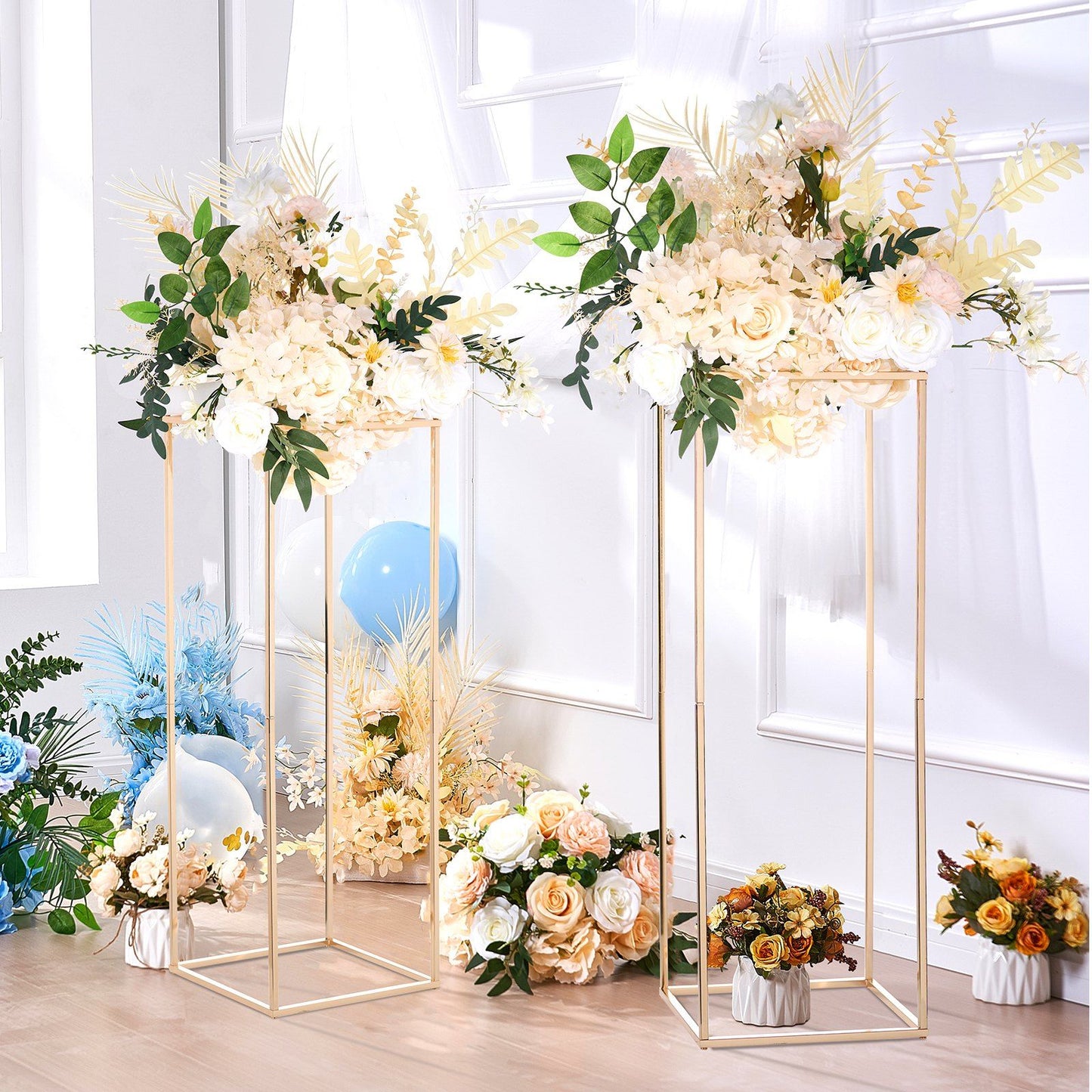 Elegant gold geometric flower stands with lush floral arrangements for modern decor