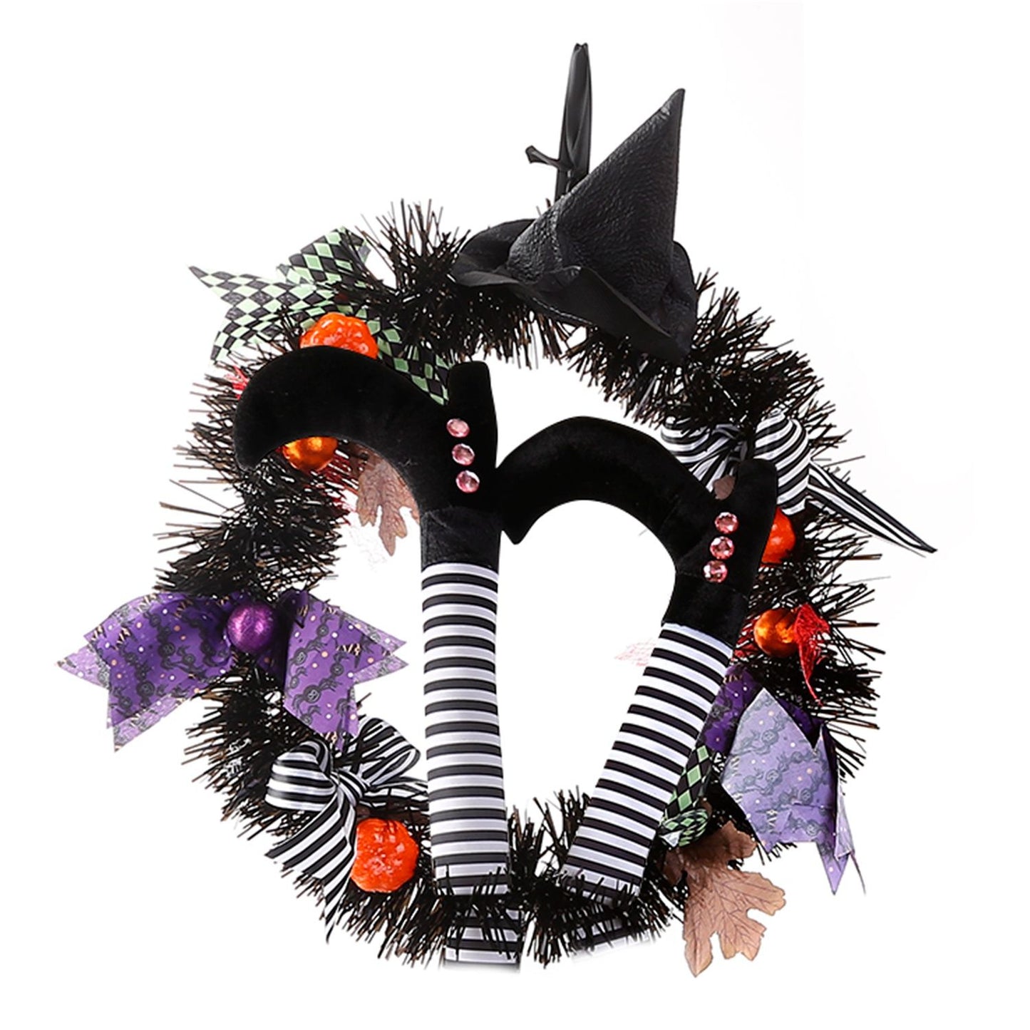 Halloween witch wreath with black tinsel, striped witch legs, purple bows, orange pumpkins, and a black witch hat