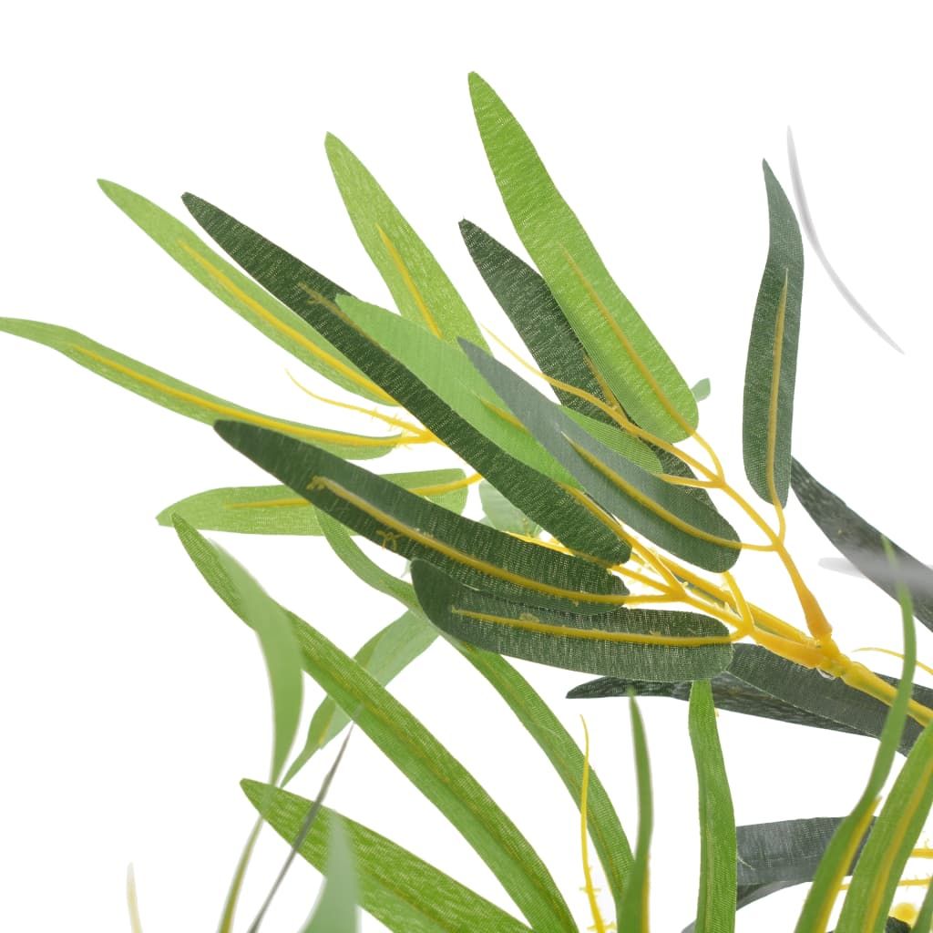 Close-up of indoor faux green bamboo decor with vibrant green leaves for home styling