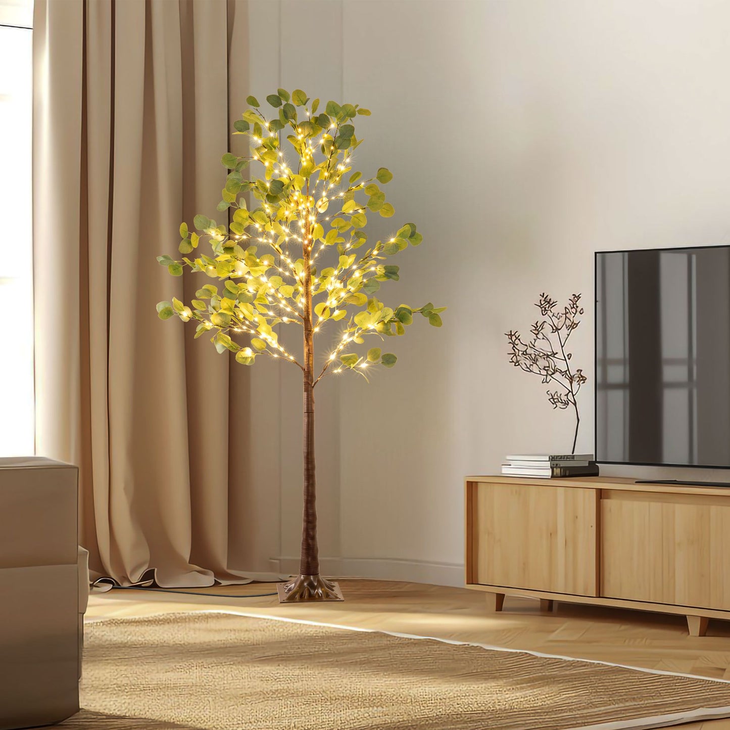Lighted artificial olive tree with warm white lights standing in a modern living room corner
