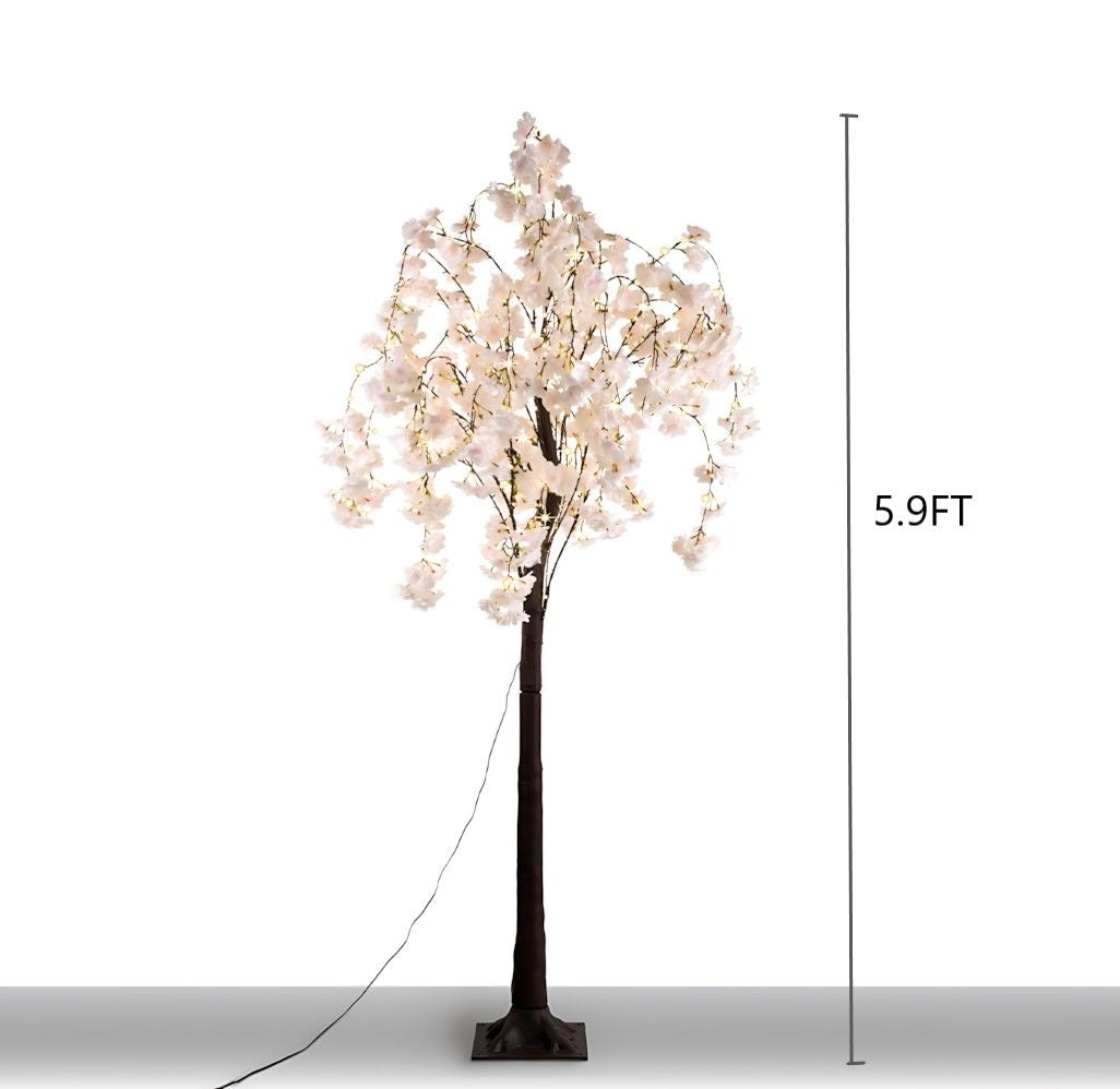 5.9 foot lighted cherry blossom tree decor with white flowers and dark brown trunk from FauxMart.com
