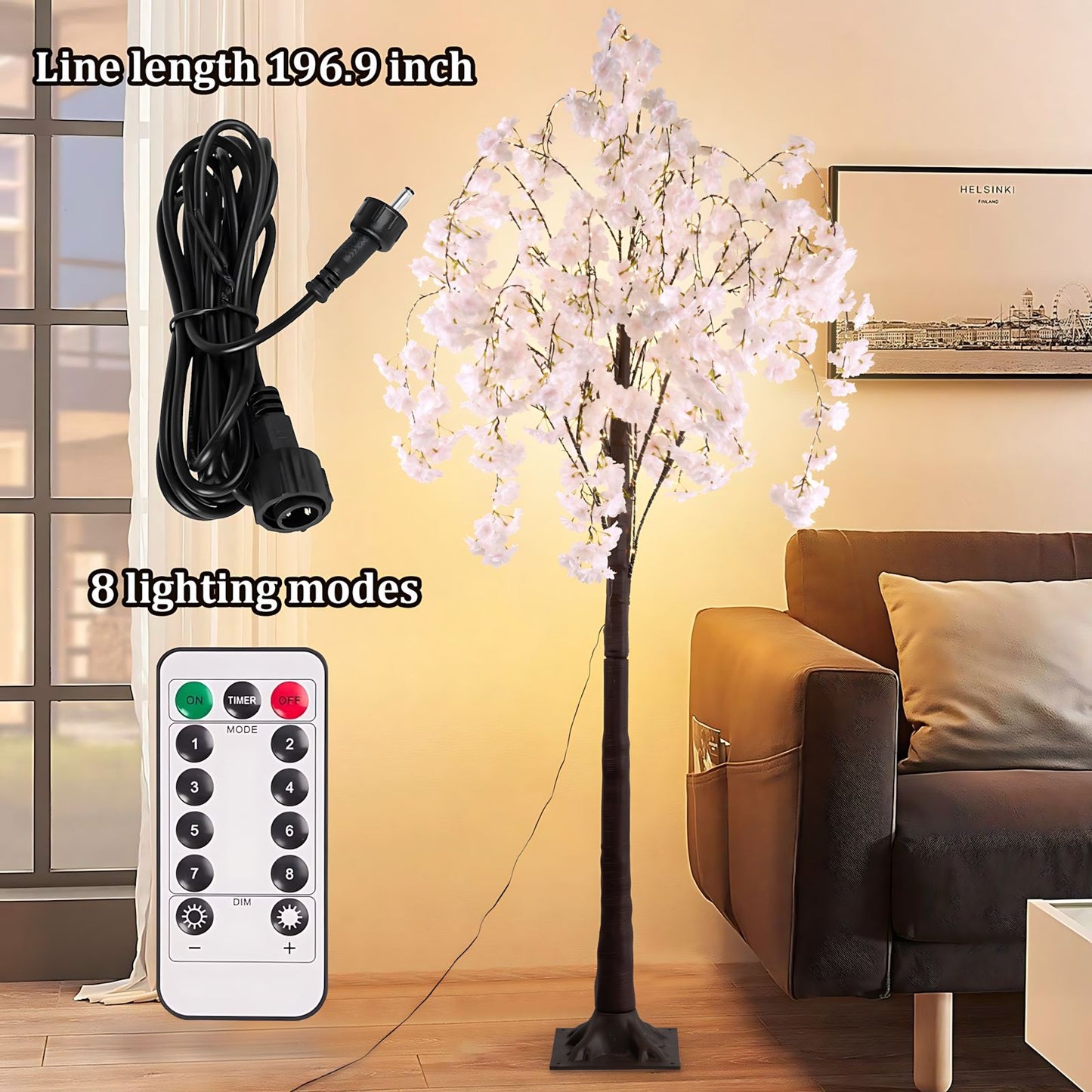 Lighted cherry blossom tree decor with remote control and long power cord in a cozy living room