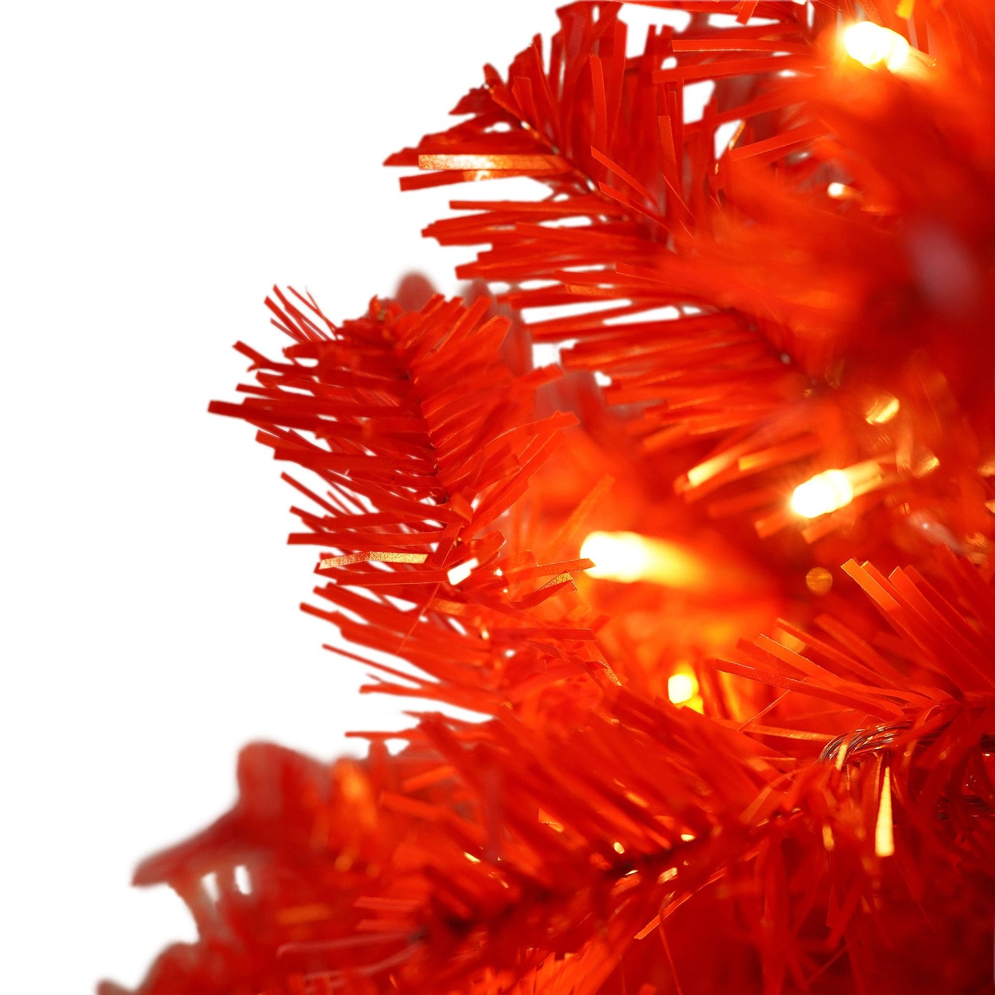 Close-up of red lighted santa hat christmas tree with glowing warm white lights on FauxMart.com
