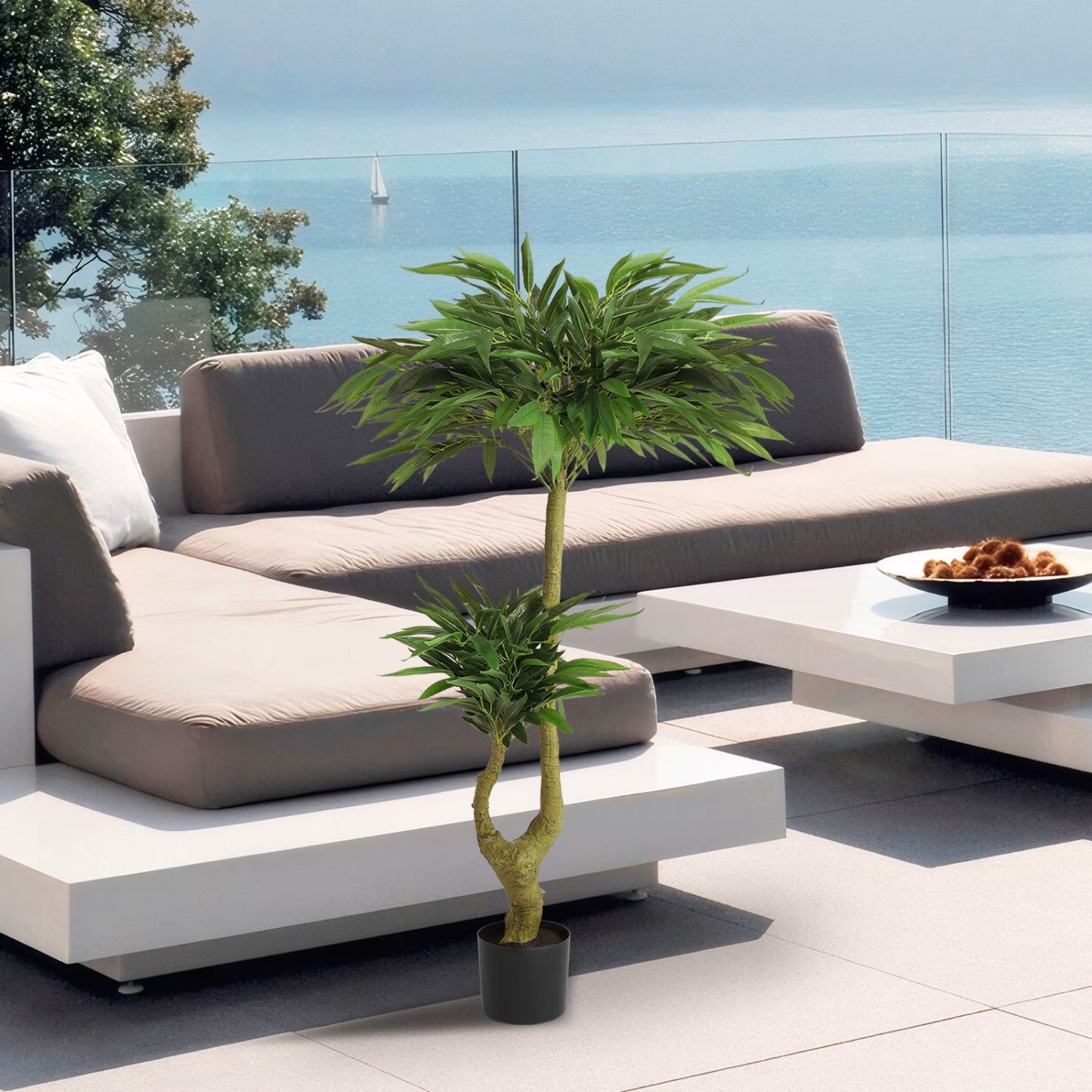 Lifelike long artificial plants for indoors in a modern living space with outdoor view