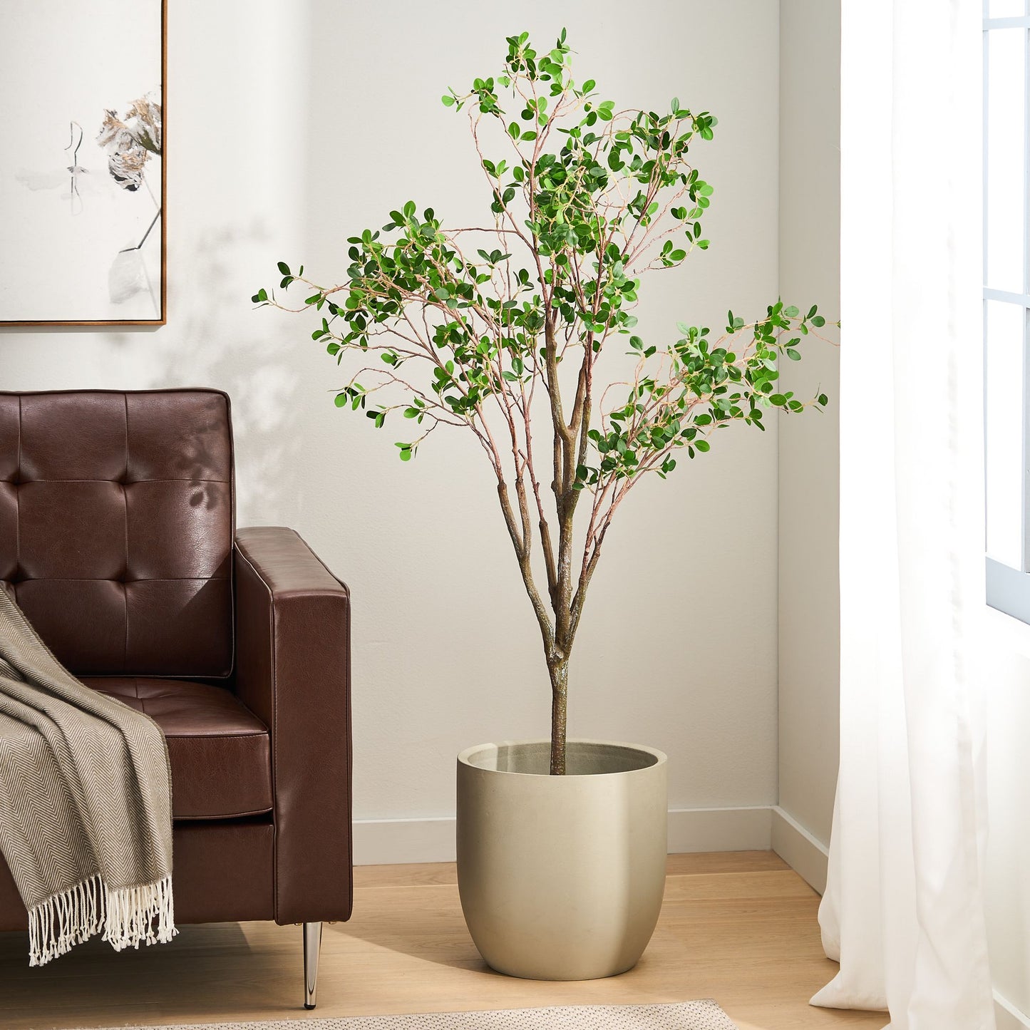 Milan leaf artificial plant in a stylish pot, perfect for home decor and indoor greenery