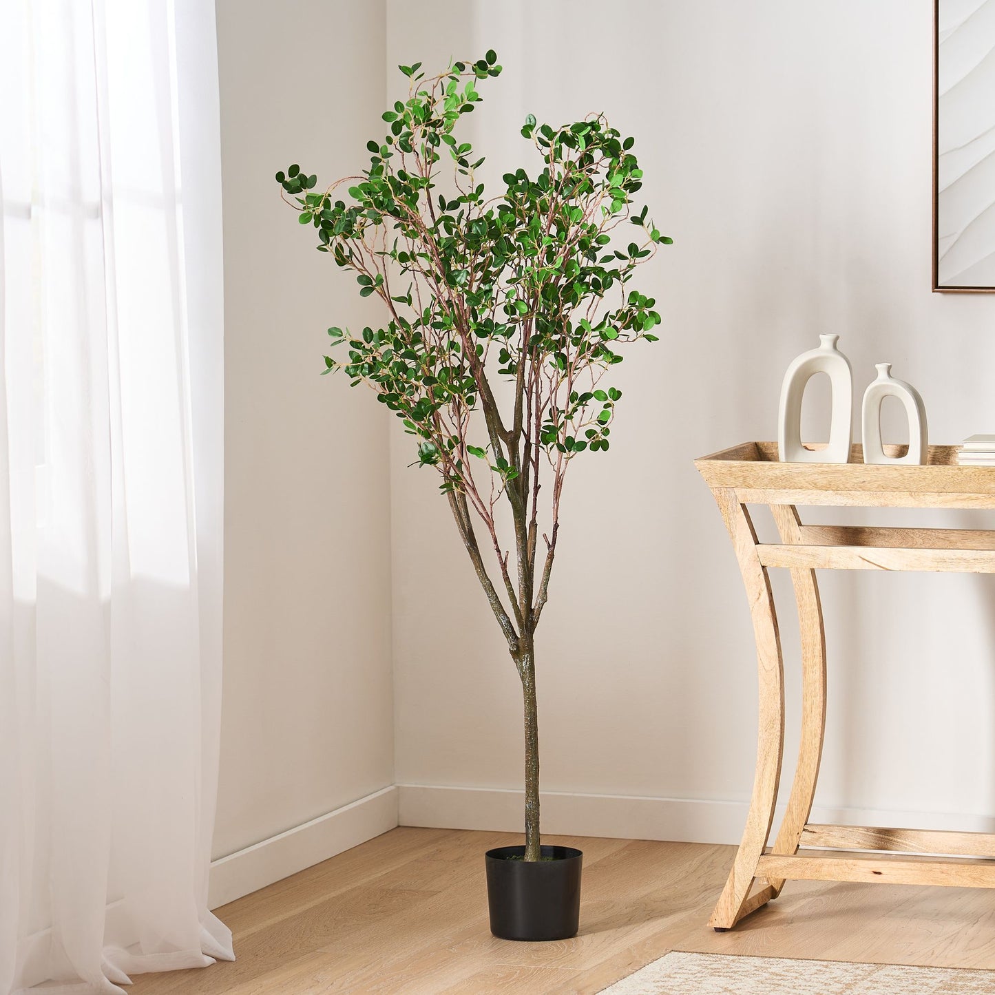 Milan leaf artificial plant in decorative pot, perfect for home decor and vibrant greenery
