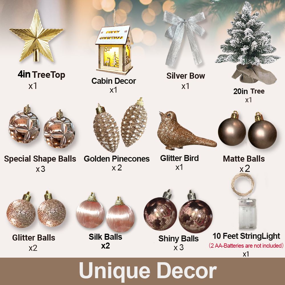 Mini tabletop Christmas tree with lights and decorative ornaments including silver bow, golden pinecones, glitter bird, and string lights