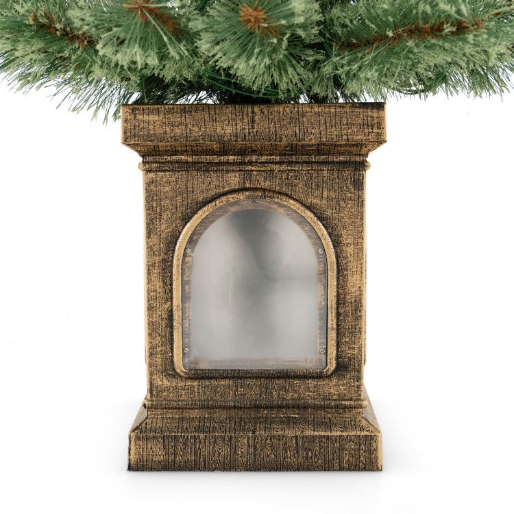 Base of a pre-lit artificial Christmas tree with a decorative bronze finish