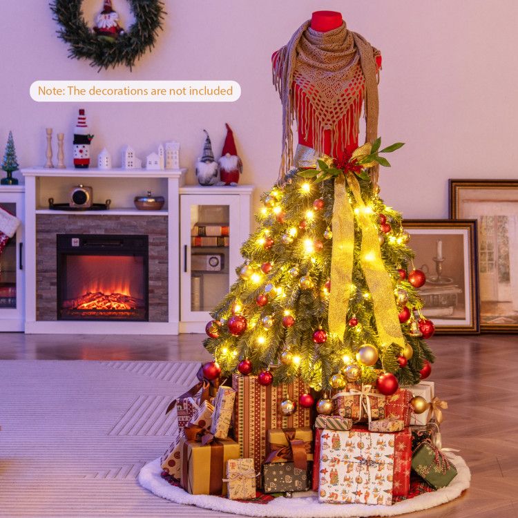 Faux pre-lit mannequin Christmas tree adorned with lights and surrounded by wrapped gifts