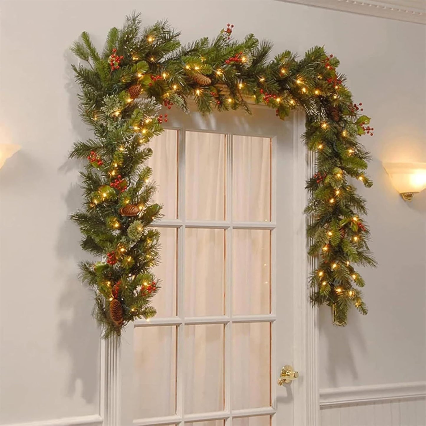 Prelit artificial Christmas garland adorned with pinecones and lights, perfect for festive decor