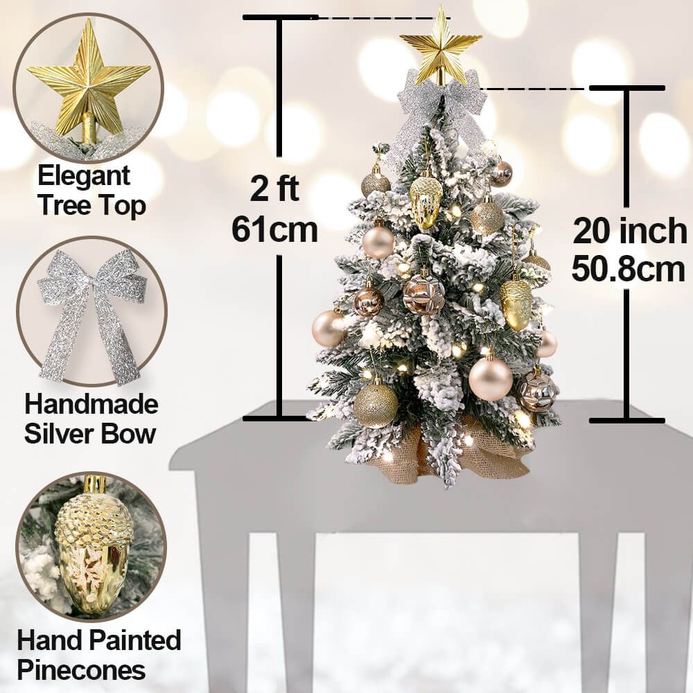Small Xmas tree for office desk with elegant tree top star, handmade silver bow, and hand painted pinecones