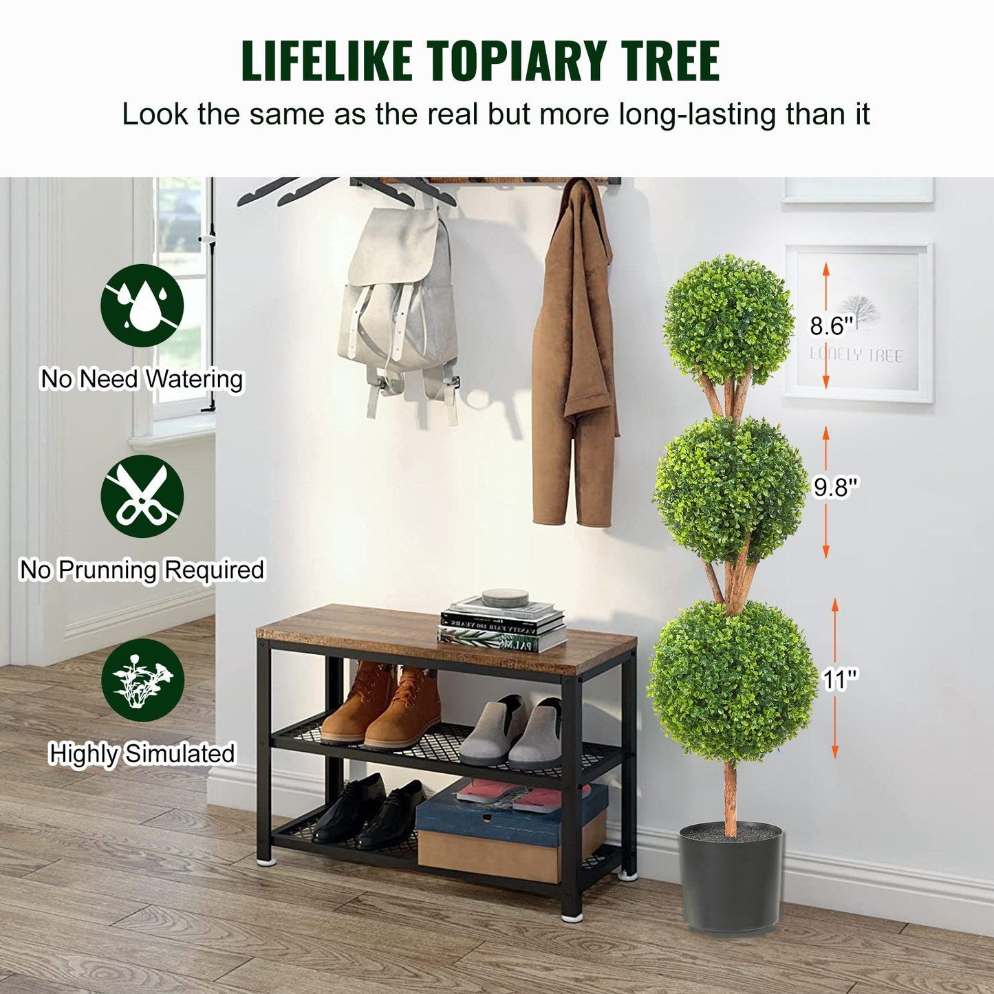 Lifelike faux boxwood trees set with three green spheres in a black pot placed in a modern entryway