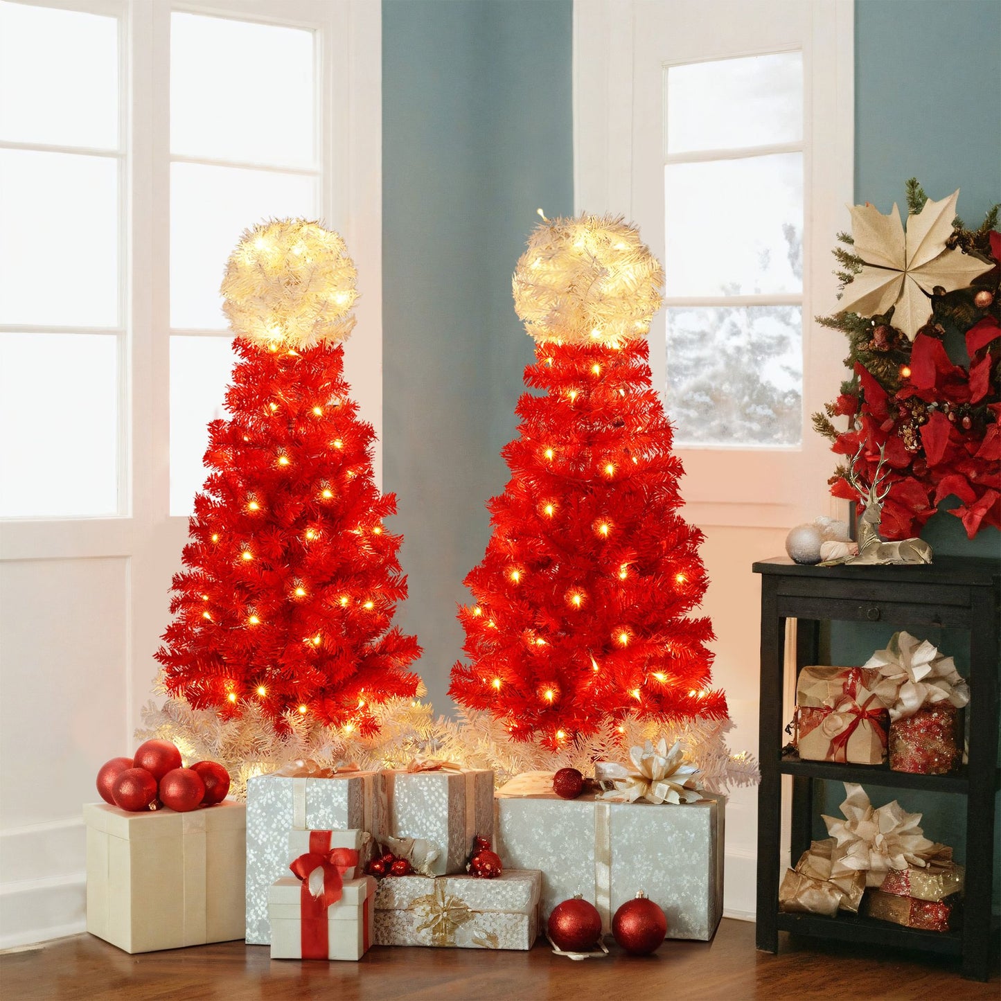 Lighted Santa hat Christmas tree set with red and white tinsel and warm white lights displayed with Christmas gifts