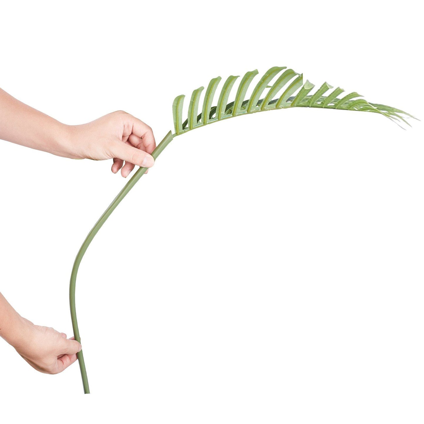 Hands holding a green frond from a 6ft artificial palm tree showing detailed leaf design