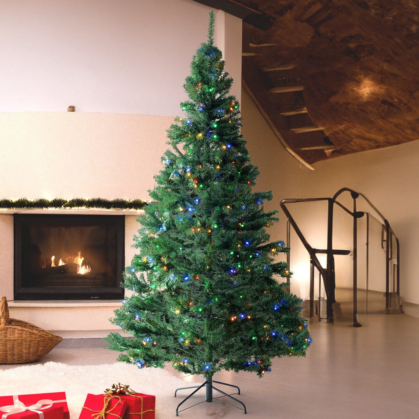 7.5 foot prelit Christmas tree with multicolor lights set up in modern living room near fireplace