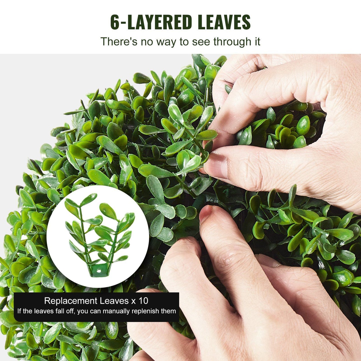 Close-up of hands adjusting 6-layered leaves on artificial boxwood topiary tree with replacement leaves feature